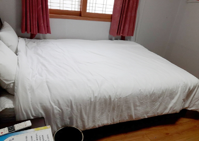 Established 18-Room Lodging Facility in Prime Location Near Jeju Airport