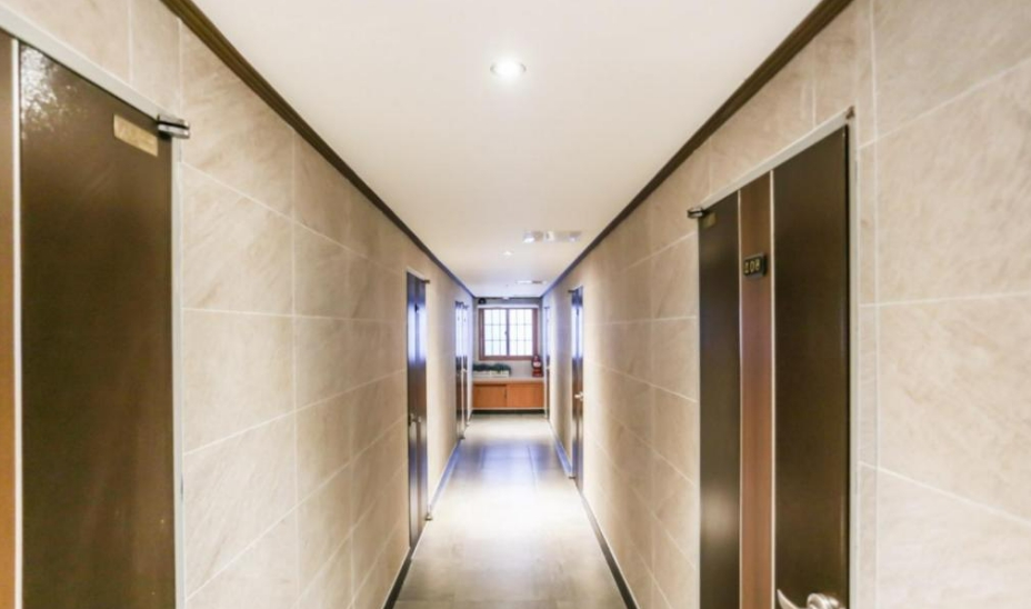 High-Yield Budget Hotel & Residential Building | Small-Scale Commercial Property Fire Sale