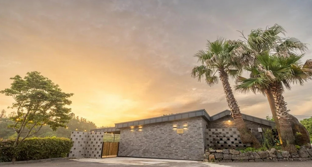 For Sale: 21-Room Hotel in Seogwipo, Jeju Featuring Outdoor Swimming Pool, BBQ Area & Rooftop Amenities