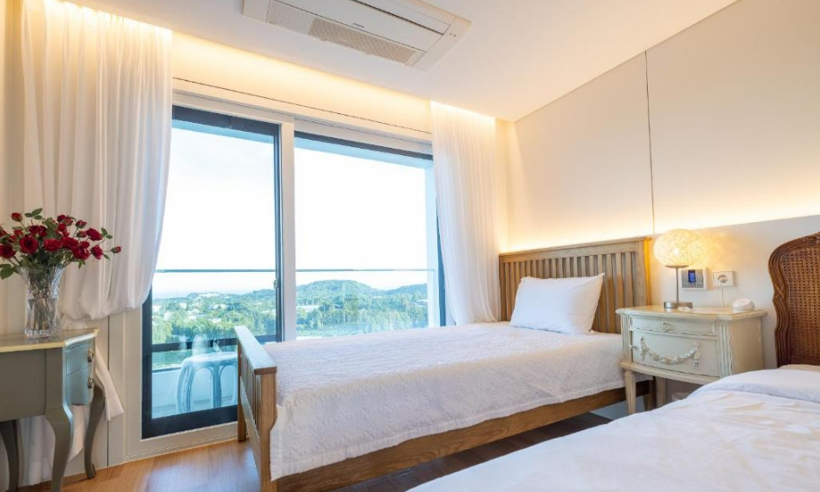 For Sale: 21-Room Hotel in Seogwipo, Jeju Featuring Outdoor Swimming Pool, BBQ Area & Rooftop Amenities