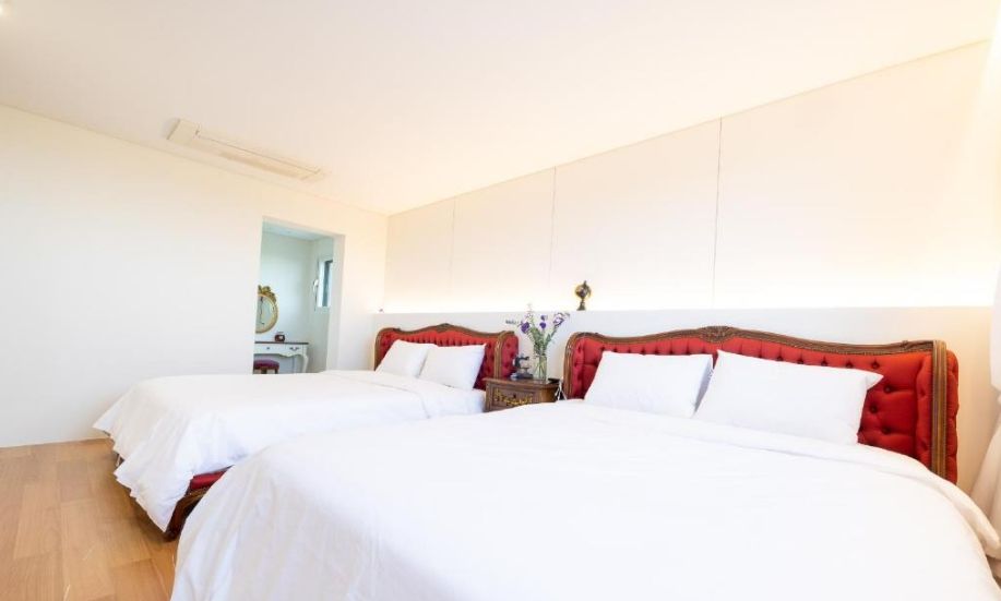 For Sale: 21-Room Hotel in Seogwipo, Jeju Featuring Outdoor Swimming Pool, BBQ Area & Rooftop Amenities